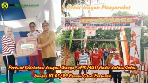 Kepala SMK Muhammadiyah 3 Terpadu Pekanbaru Muswardi MT menghadiri gerak jalan santai RT 05/09 Perum Citra Permata